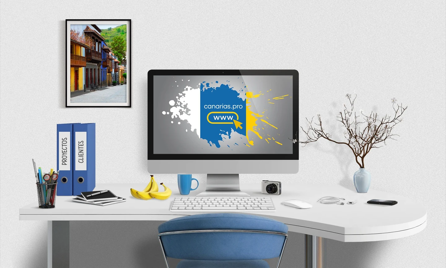 El escritorio de Canarias Pro, con nuestra web en la pantalla de un iMac